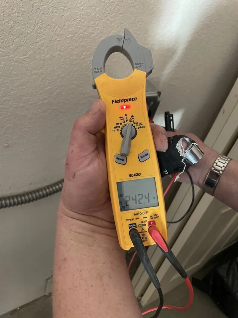 Voltage testing with clamp meter during Electrical Installation Services in Hopkinsville